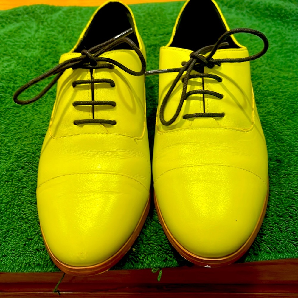 Kate Spade colorful tie shoes.